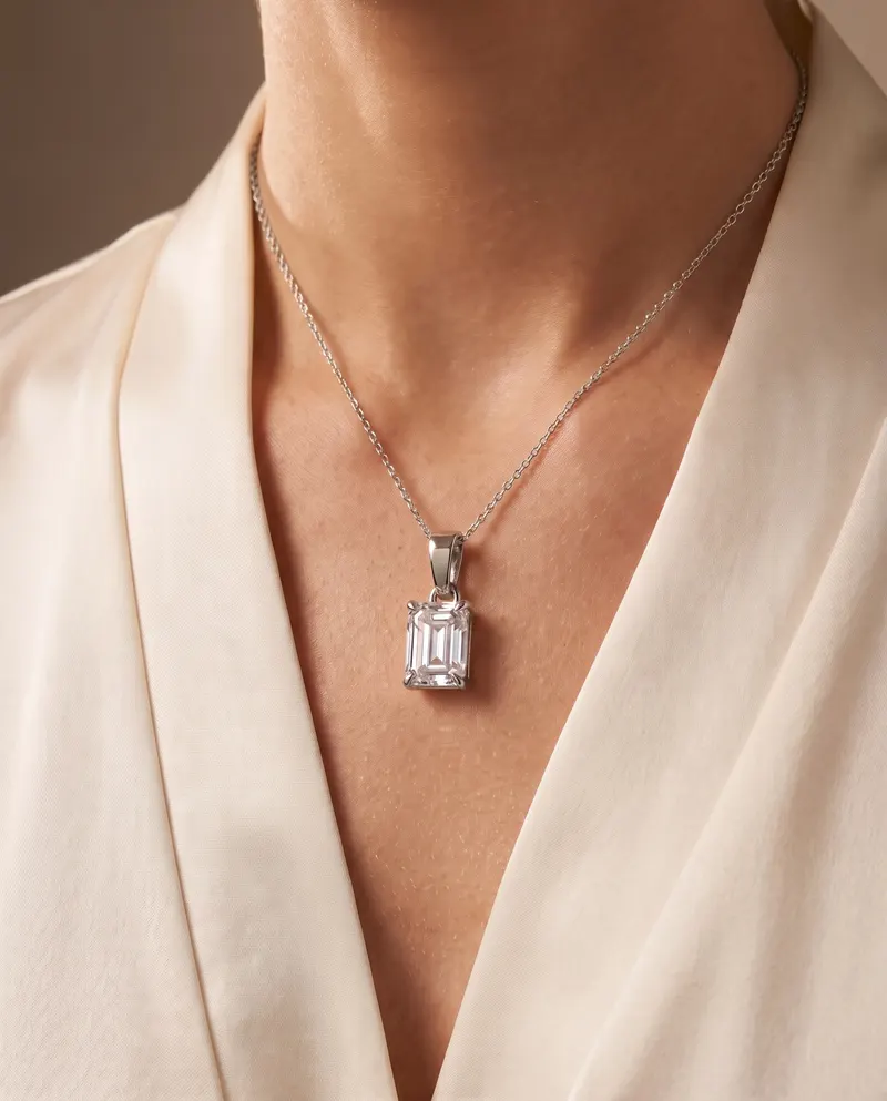 Colonnade Emerald Cut Claw Set Pendant