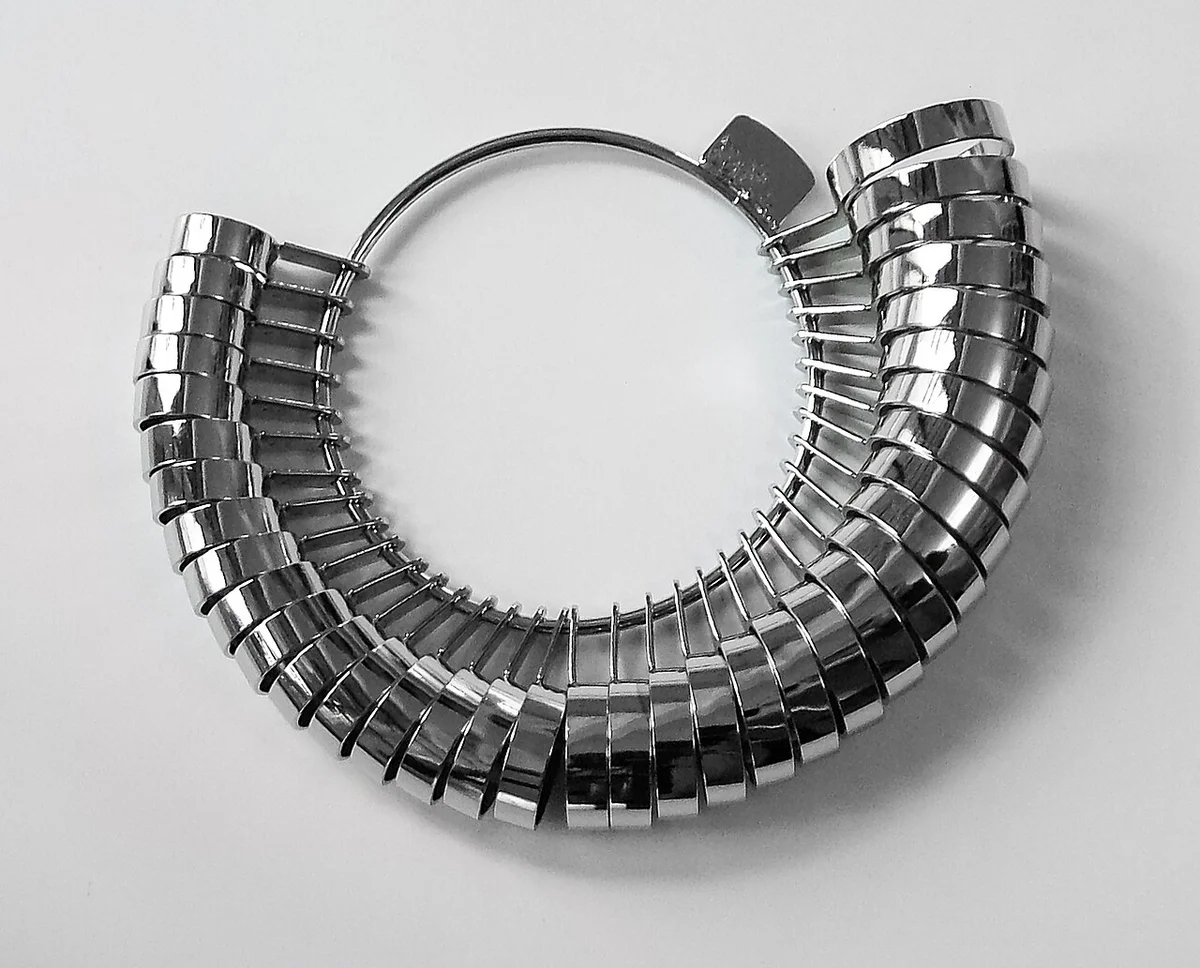 A set of metal finger-sizing rings in graduated sizes.