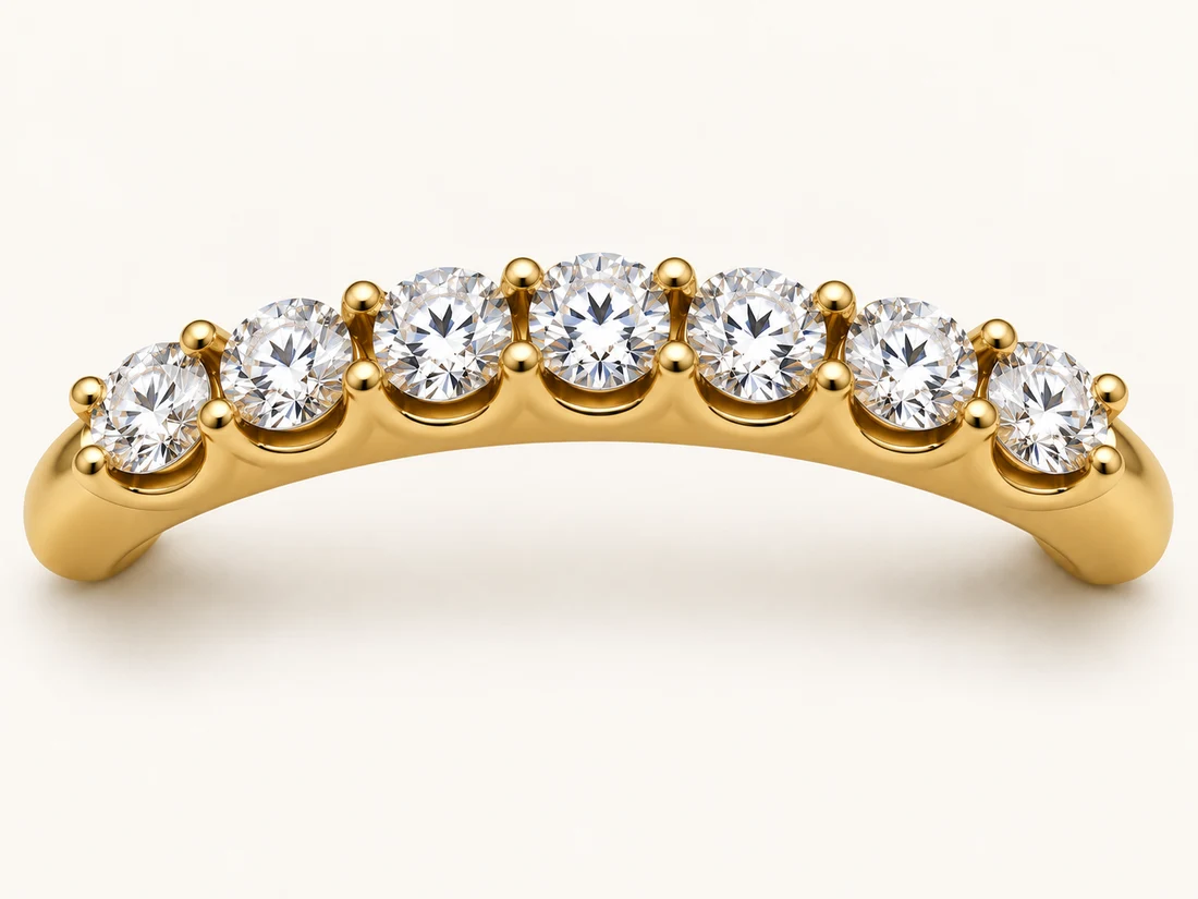 Illustration of a diamond row with rounded scalloped recesses in the gold.